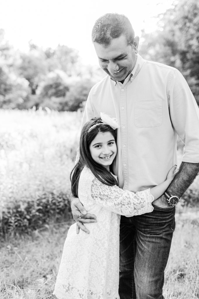 Holliston Family Photographer - Father and daughter portrait in natural light, smiling and in black and white. 
