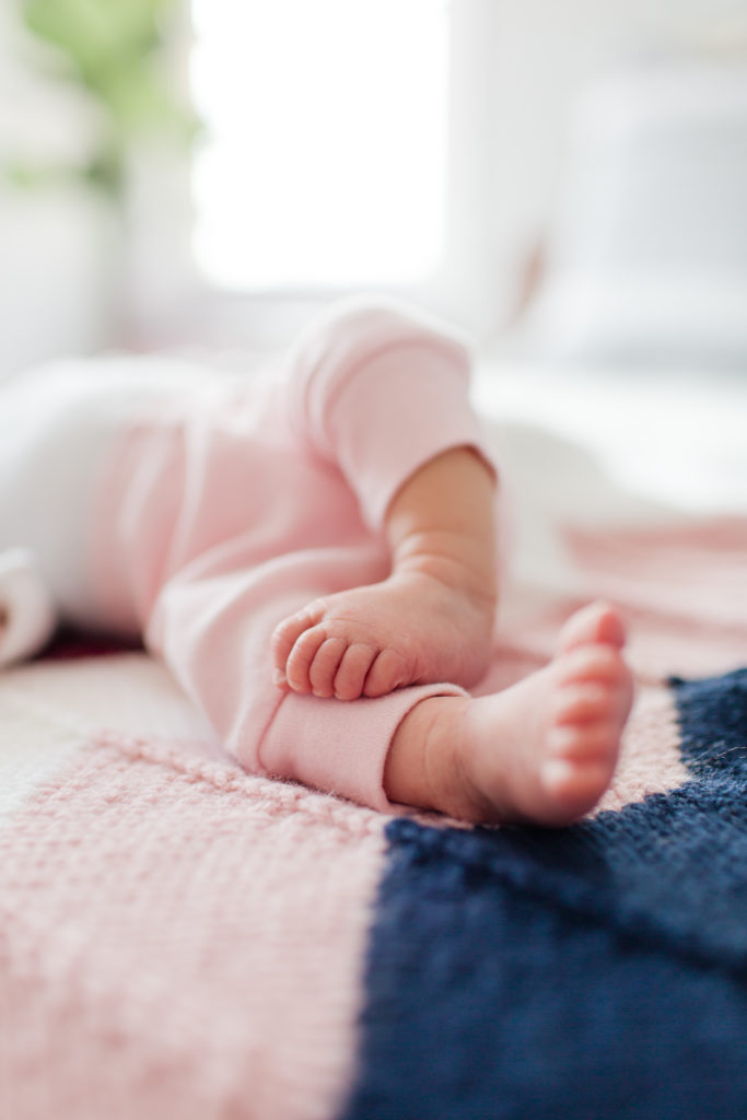 Bright and airy newborn session, baby toes.