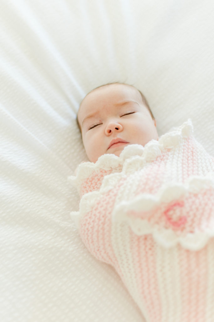 Boston Newborn photographer newborn baby sleeping wrapped in blanket