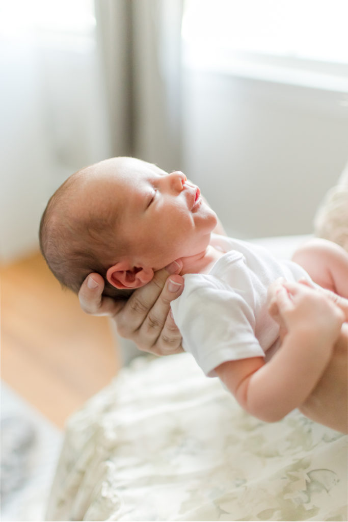 Close up photo of newborn baby in natural light / Boston Area Newborn Photographer Corinne Isabelle