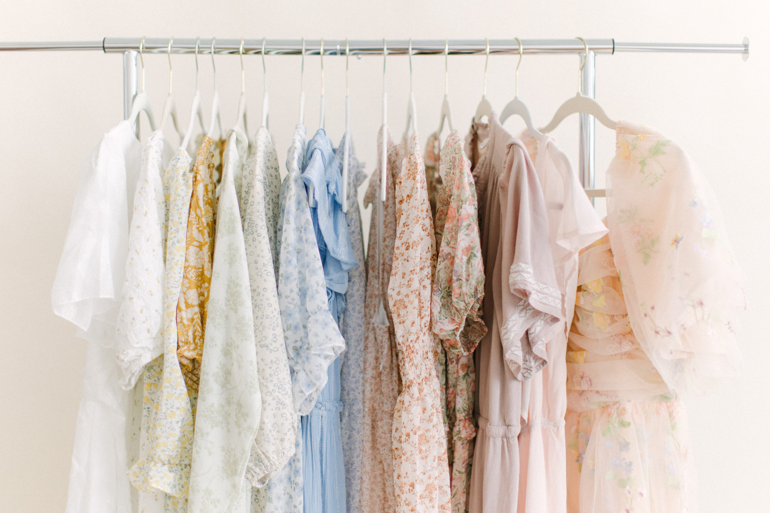 The client closet full of dresses from Boston Baby Photographer Corinne Isabelle